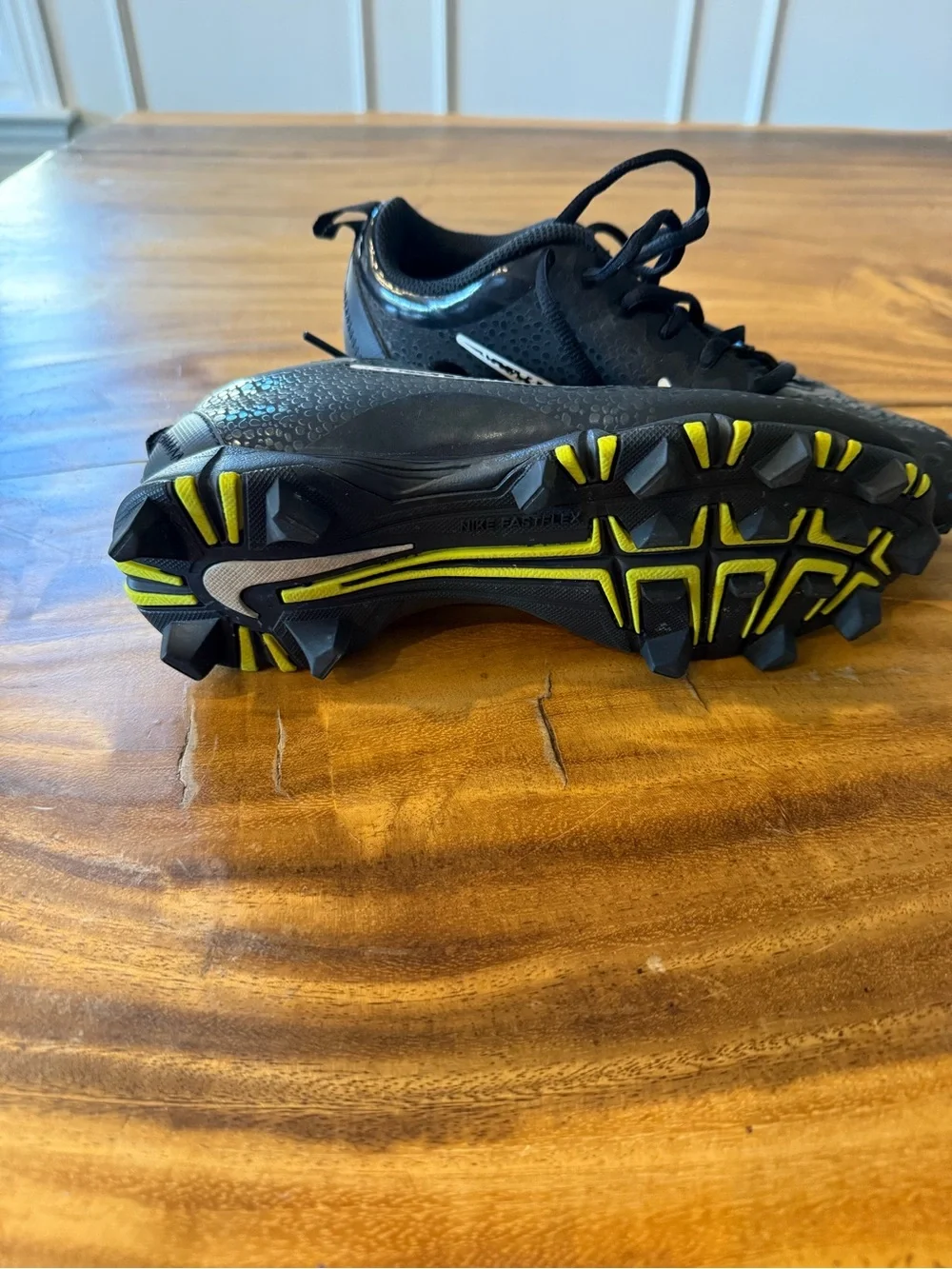 Nike Black Soccer Cleats with White Swoosh and Yellow Stud Accents - Picture 2 of 2